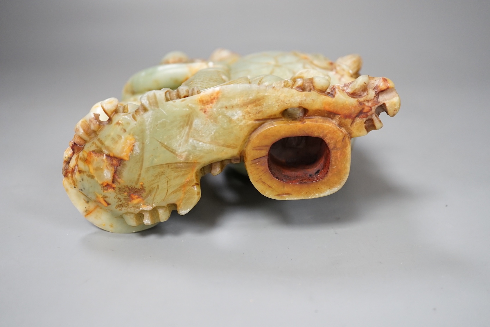 A late 19th century soapstone figural vase. 18cm